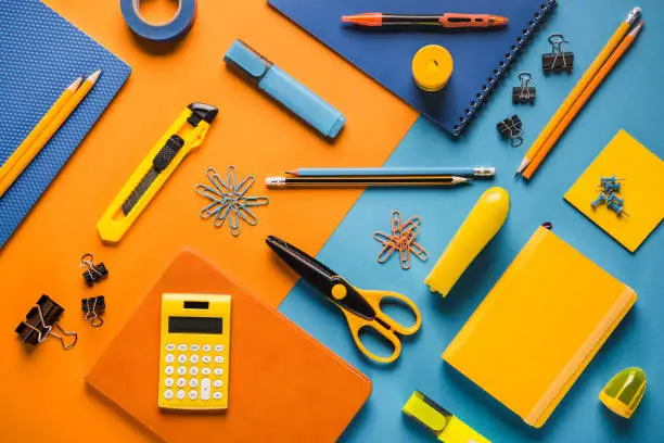 composition of orange and blue school supplies