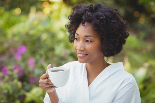 istock Smiling woman holding mug 851556862