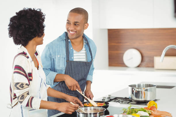 istock Happy couple cooking together 851557202