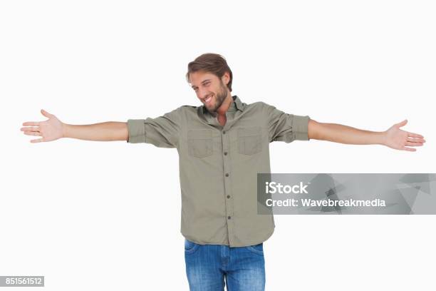 Man Standing With Arms Outstretched Stock Photo - Download Image Now - Arms Outstretched, Men, One Person