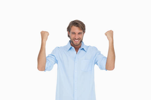 istock Smiling man in shirt cheering 851561572