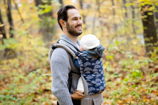 istock Father with daughter baby in autumn forest 851562512