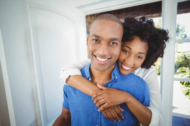 istock Happy couple holding box 851565838