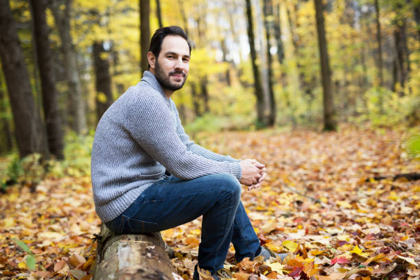 istock middle-aged man alone on beautiful autumn day 851566532