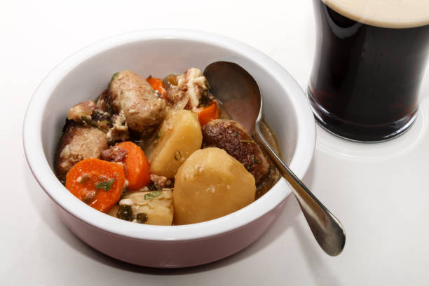 dublin coddle with carrot, potato and sausage in a bowl