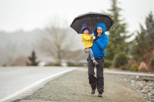 istock Family Walk in the Rain 851570154