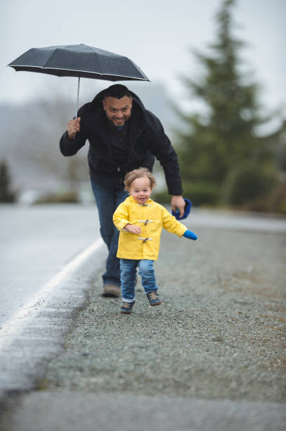 istock Family Walk in the Rain 851570164