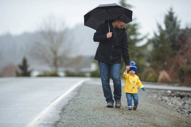 istock Family Walk in the Rain 851570166