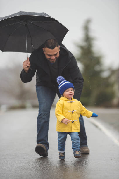 istock Family Walk in the Rain 851570176