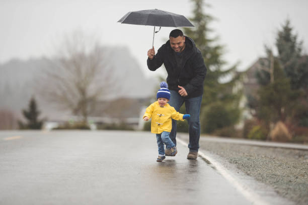 istock Family Walk in the Rain 851570206