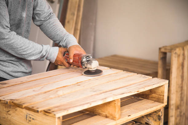 istock Wood sanding machines , Carpenter working with electrical sander on pine floor or table surface 851573304