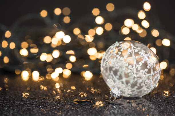 istock Shiny christmas ornament / decorations / christmas lights on black background. 851585696