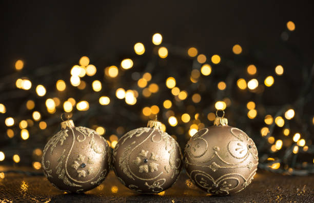 istock Shiny christmas ornament / decorations / christmas lights on black background. 851585954