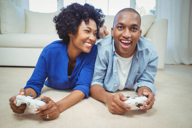 istock Smiling couple lying on the floor 851589596