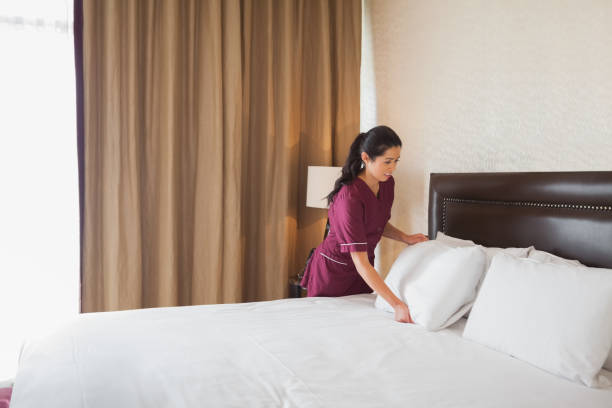 istock Hotel maid making the bed 851589724