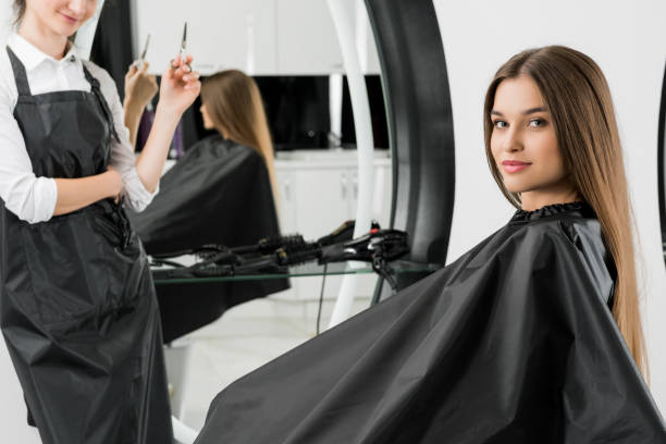istock young woman with hair stylist 851589976