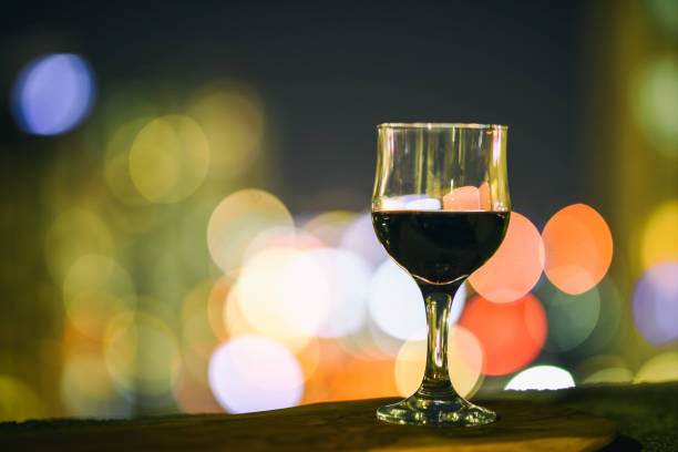 istock Red Wine And City Lights 851590998