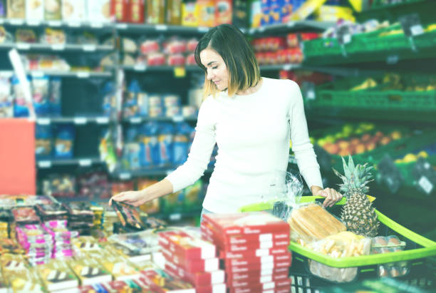 istock Woman choosing delicious sweets 851625924