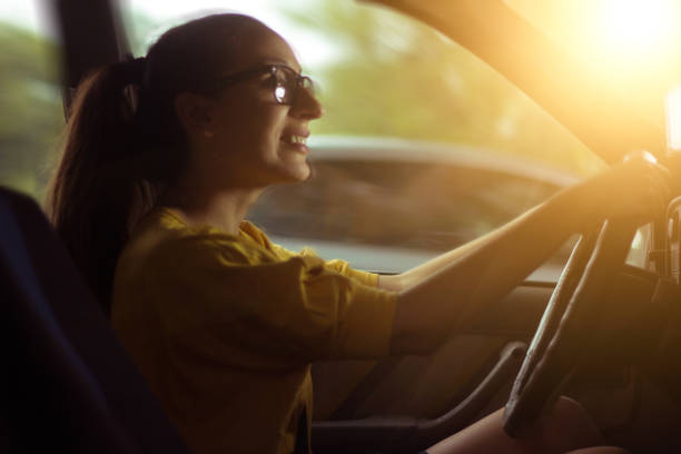 istock Hipster woman driving a car 851628284