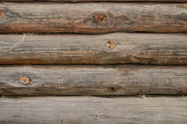 istock Old wooden log house wall 851629328
