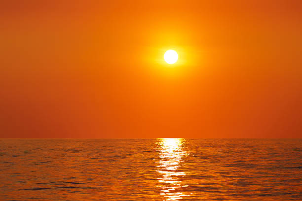 istock Sunset or sunrise over a river or lake 851633150