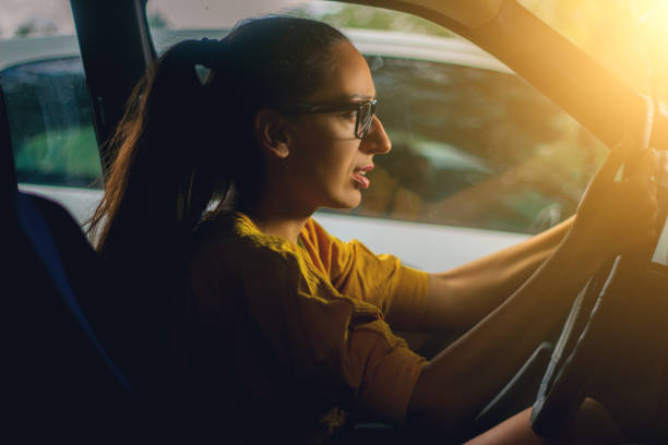 istock Hipster woman driving a car 851643222