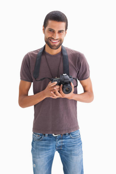 istock Happy man with camera around his neck 851665406
