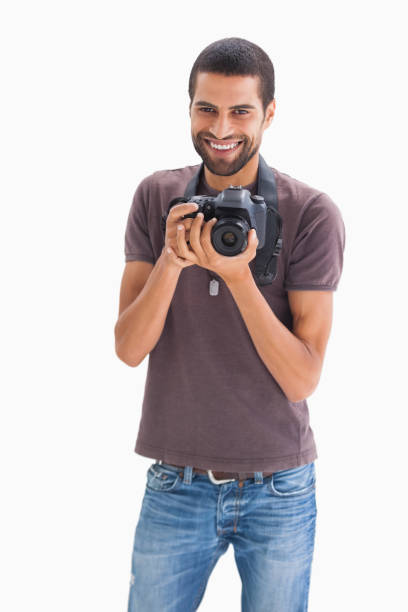 istock Cheerful man with camera around his neck 851665478