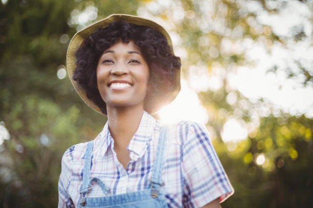 istock Smiling woman in the garden 851666594
