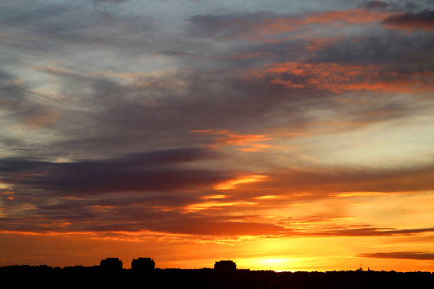 istock Photo of a brightly beautiful sunset with clouds 851690240