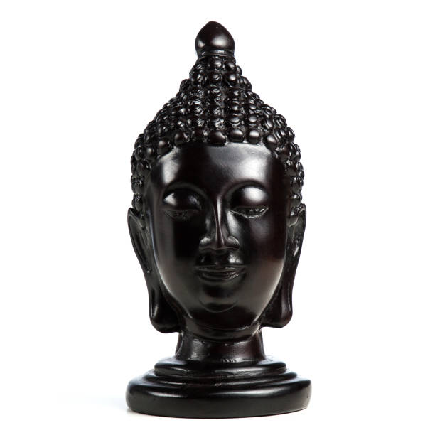 istock Statue of Buddha head black. isolated white background. 851692026
