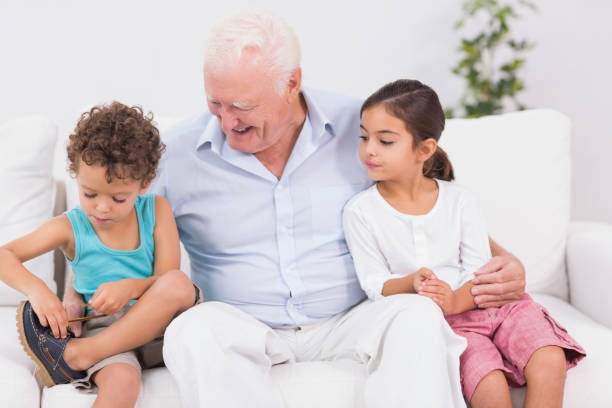 istock Grandson tying his shoelaces 851716294
