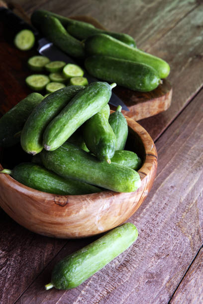 istock Fresh and sliced cucumbers. Sliced cucumbers on a cutting board. 851758246