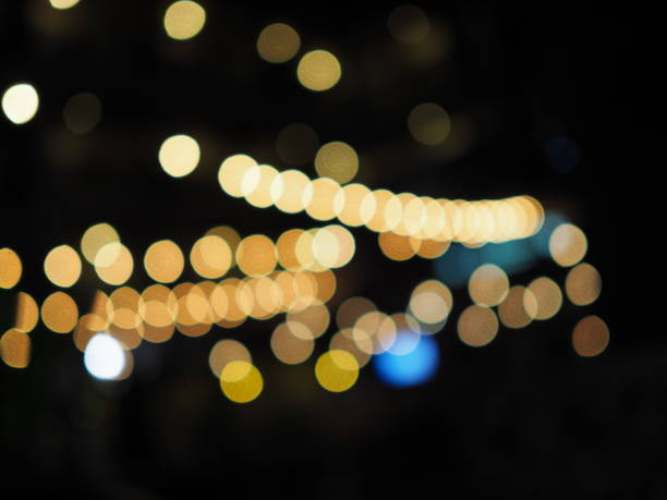 istock Blur yellow bokeh curve stacked line, black background 851779650