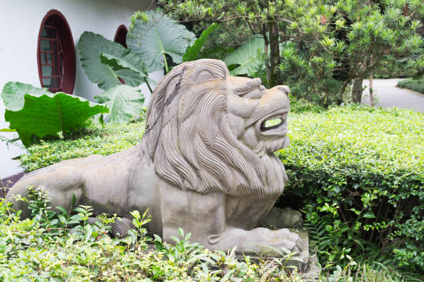 istock Lion stone statue in a park 851780692
