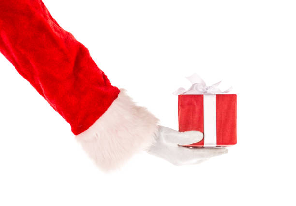istock Santa Claus hand holding out gift box 851780934