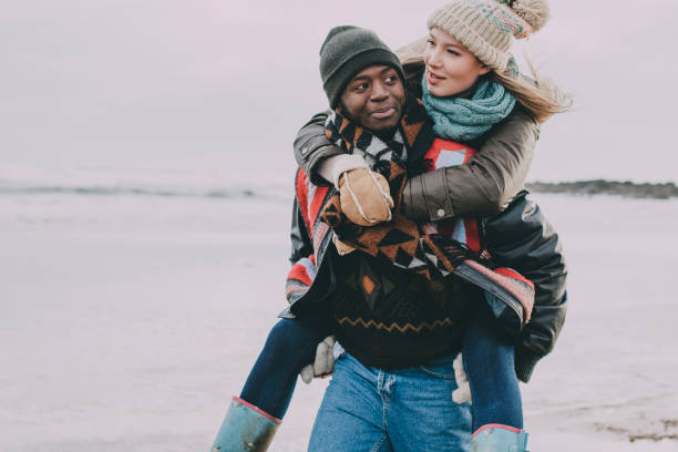 istock Young Couple Enjoy A Winter Beach 851789082