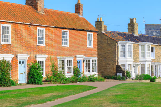 Old fashioned holiday brick cottages in Southwold, Suffolk, UK Old fashioned holiday brick cottages in Southwold, a popular seaside town in the UK southwold stock pictures, royalty-free photos & images