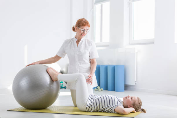 istock Girl during gymnastic correction 851793260