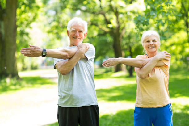 istock Senior Couple Exercising In Park 851794170