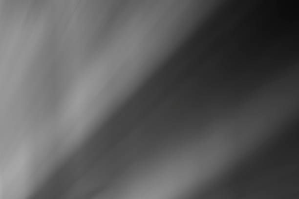 istock Warm sun rays light effects isolated on black background for overlay design 851801688
