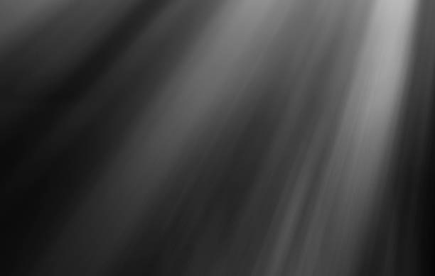 istock Warm sun rays light effects isolated on black background for overlay design 851802130