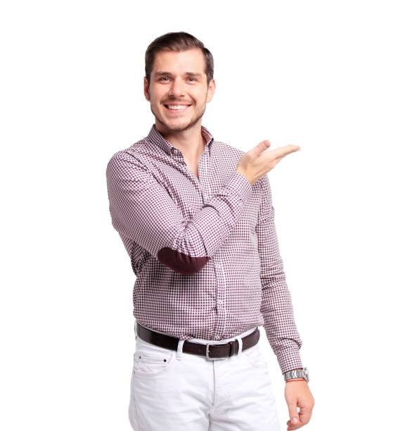 istock Happy smiling young man presenting and showing your text or product isolated on white 851802398