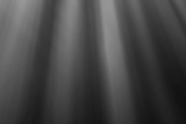 istock Warm sun rays light effects isolated on black background for overlay design 851805320