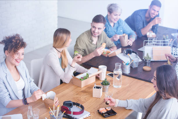 istock Girl eating sushi 851806740