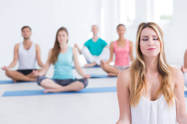 istock Young woman is meditating 851826048