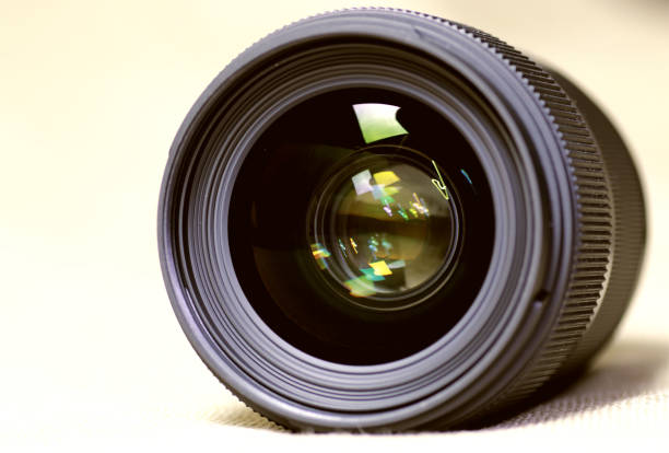 istock toned monochrome background of lens flare object 851826304