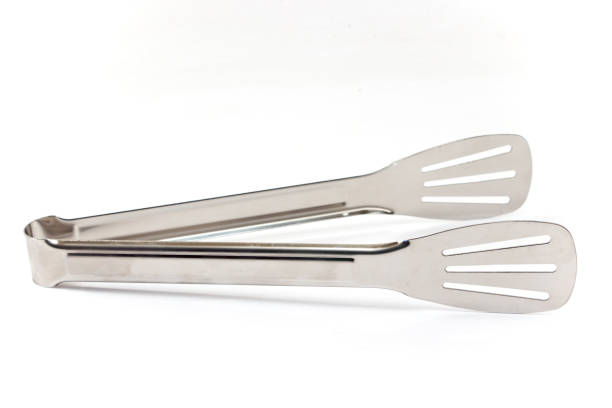 istock Serving kitchen tongs isolated on  white background 851826350