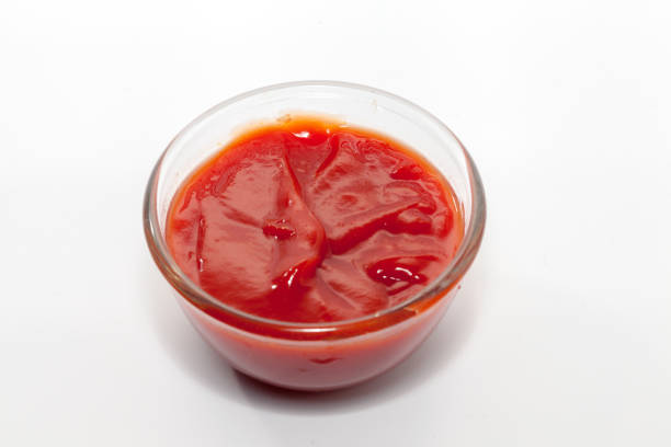 istock tomato sauce in bowl on white background 851828828