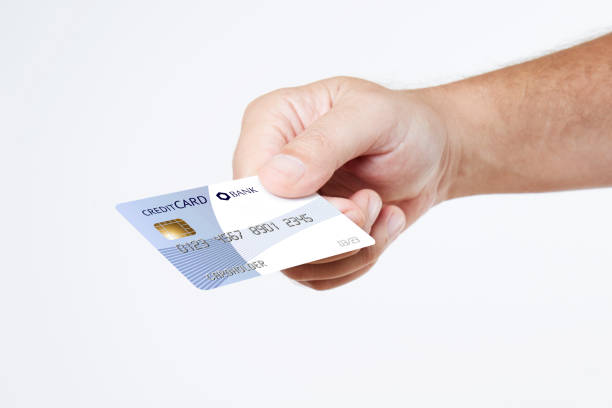 istock Man holding blue credit card 851836800
